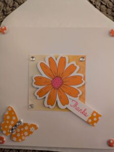 Front of the Thank You card is made up of decoupage a flowers and a butterfly