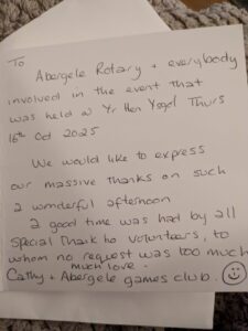 The content of the card reads: To Abergele Rotary & everyone involved in the event that was held at Yr Hen Ysgol Thursday 16th October 2025.We would like to express our massive thanks on such a wonderful afternoon. A good time was had by all. Special thanks volunteers to whom no request was too much. Much love. Cathy & Abergele Games Club.